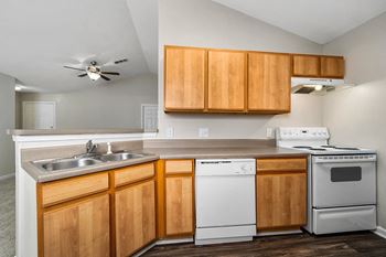 Fully-Equipped Kitchen With White Appliances - Cedar Floor Plan